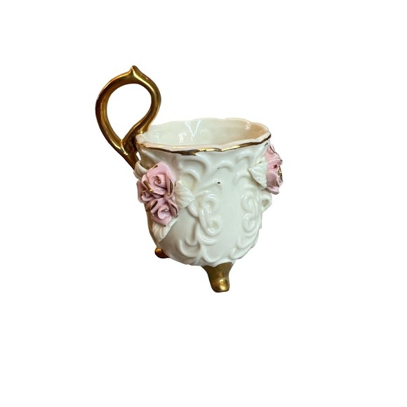 Teacup and Saucer Victorian Style Ivory Color Pink Rosette and Gold Tone Trim - Picture 2 of 3